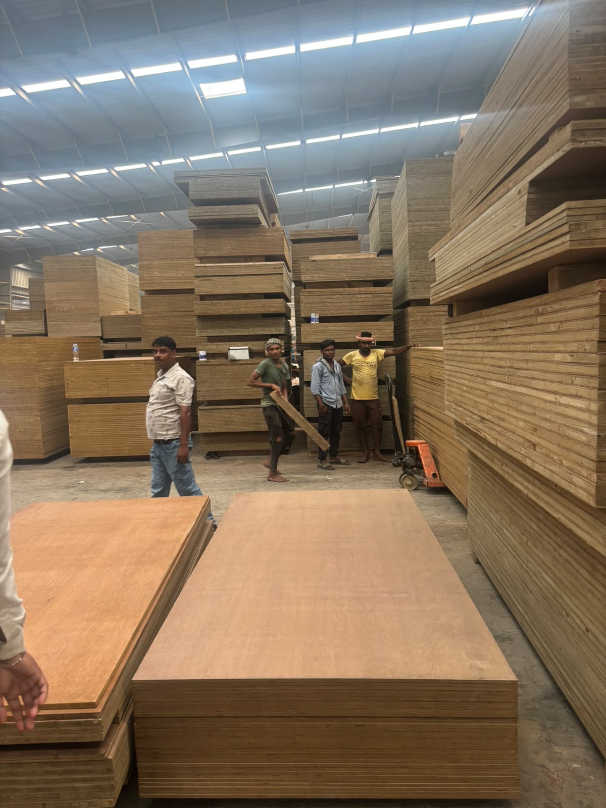 Team handling board stacks at the Micasa manufacturing unit, Gandhidham